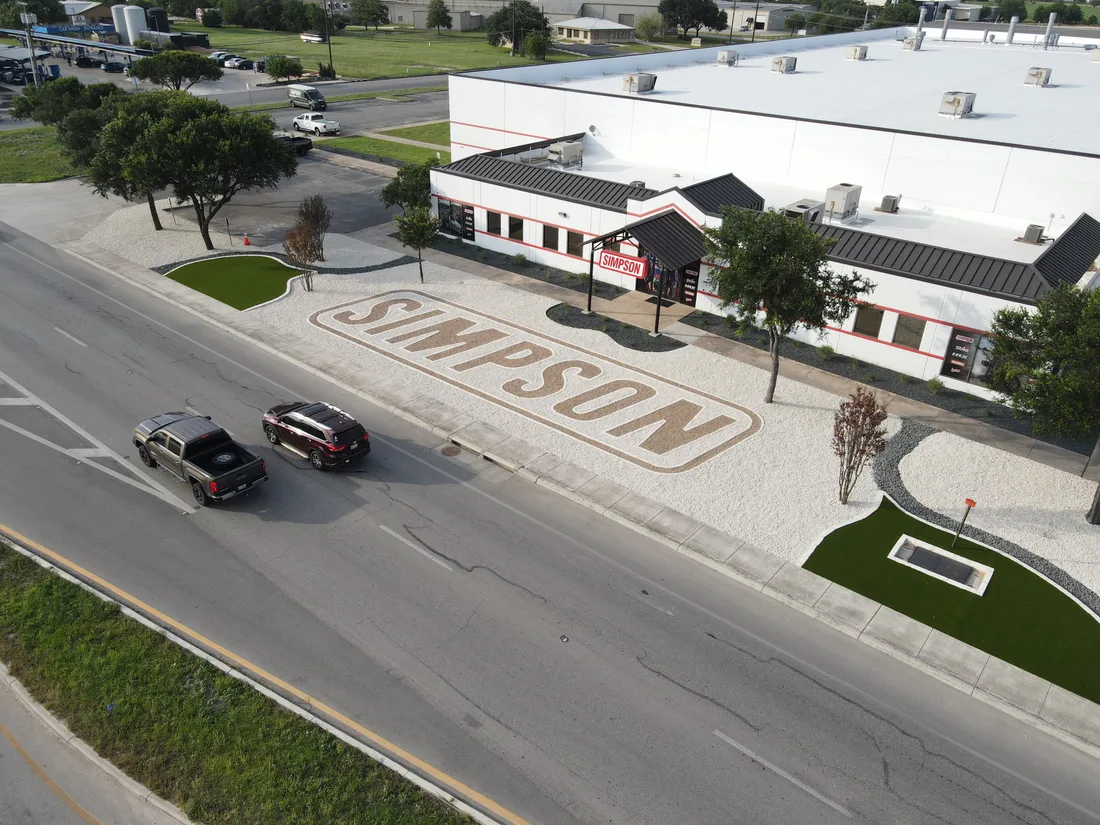 Angled aerial of the Simpson Racing frontage from the street