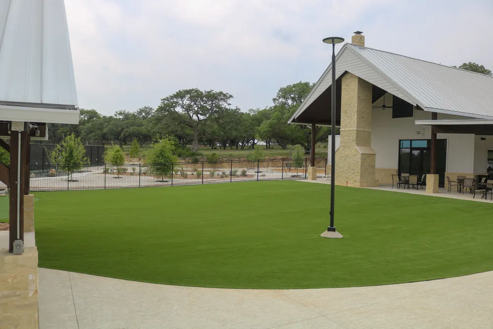 Artificial turf lawn beside the Belle Oaks pavilion
